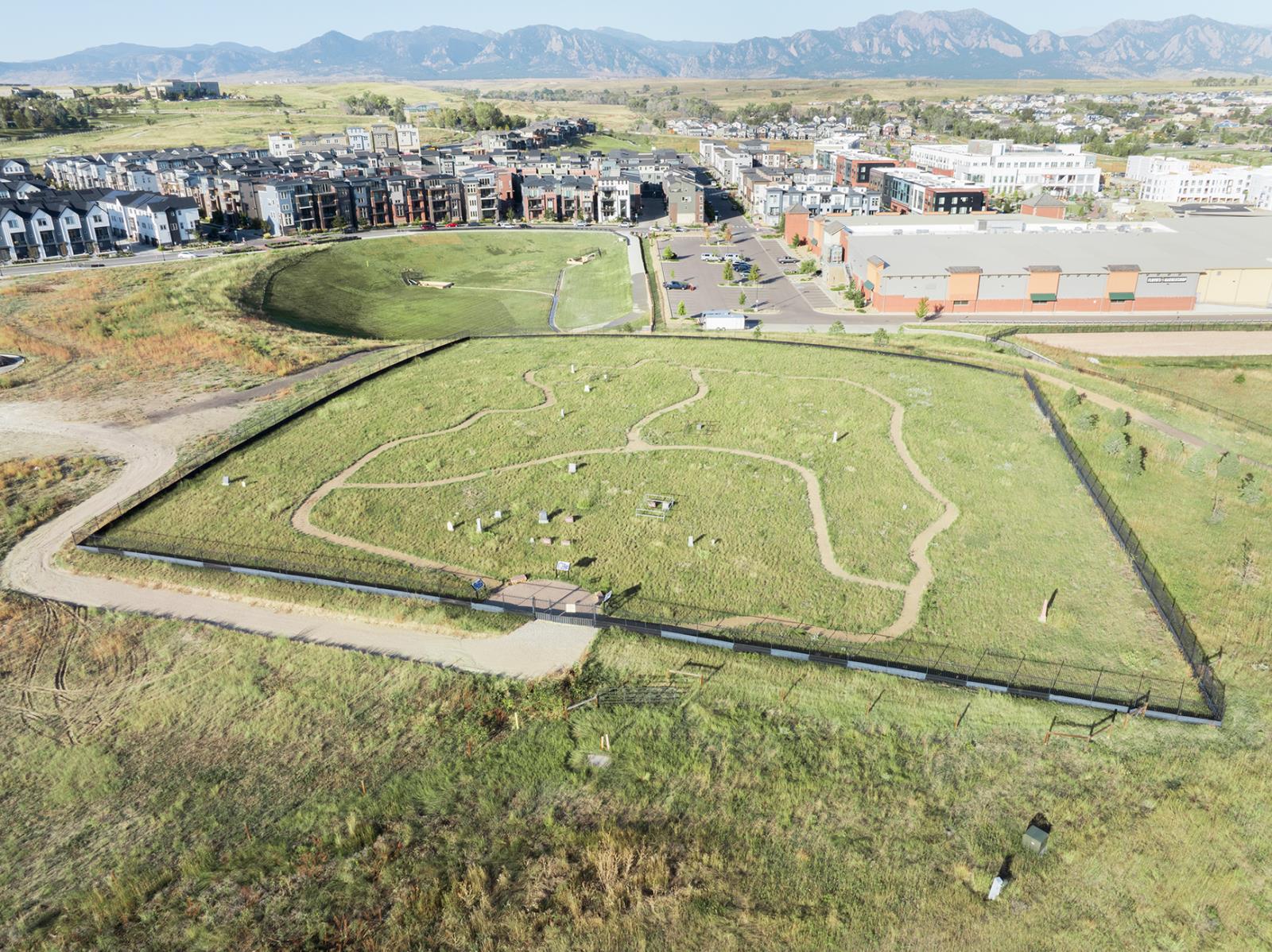 Ariel shot of the cemetery with downtown superior and the flatiorons in the background.