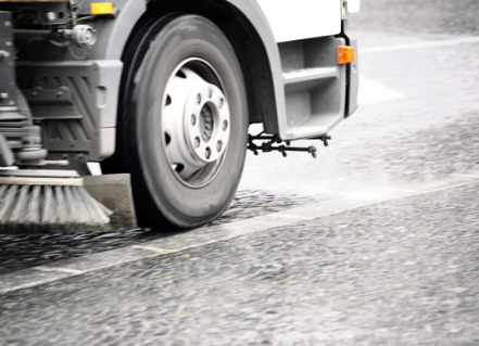 Street sweeper on the road